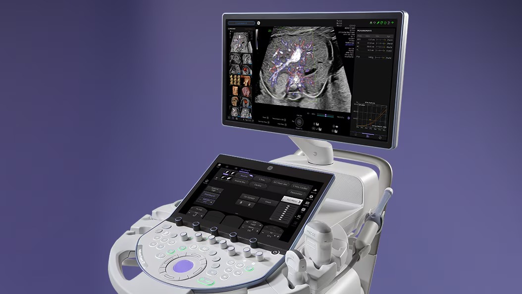 Modern ultrasound scanner with display and probes in a clinical setting